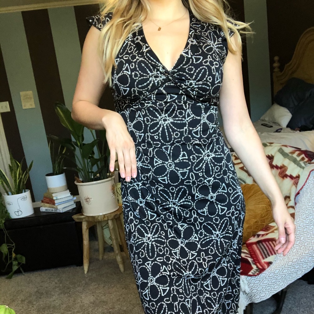 Black dress with cream colored flower detailing